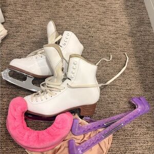 White Ice Skates with Guards and Covers